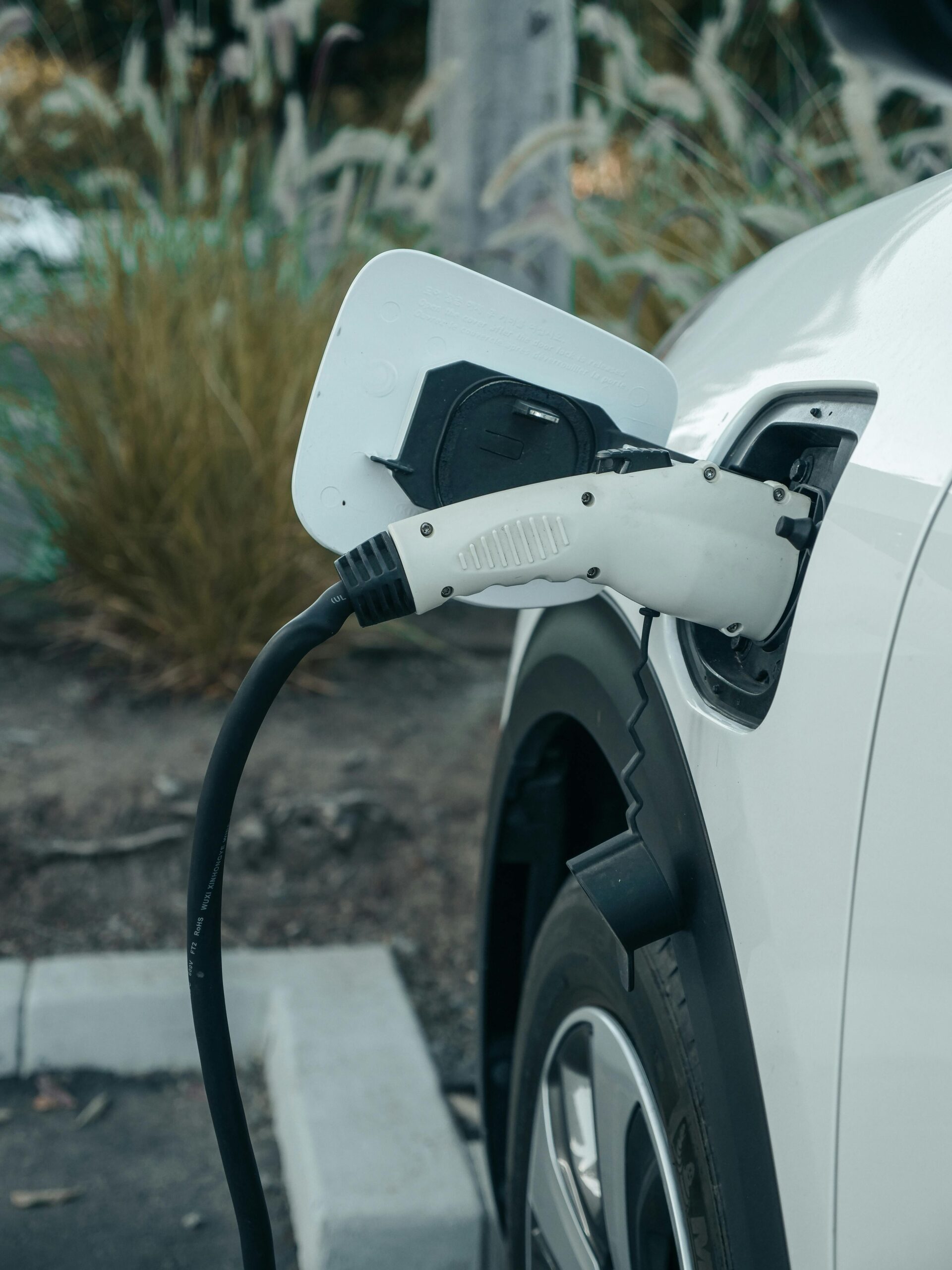 Electric Vehicle being charged at a level 2 EV charging station in Bergen County, New Jersey.