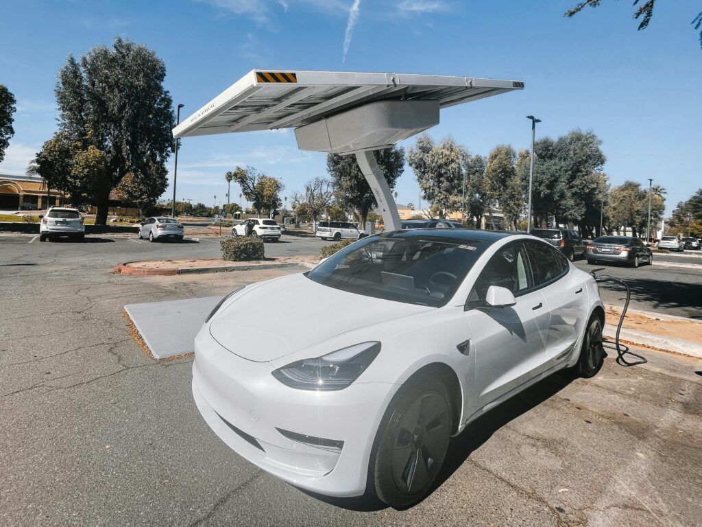 Electric vehicle charging at a commercial EV charging station installed at a business property in Bergen County, New Jersey